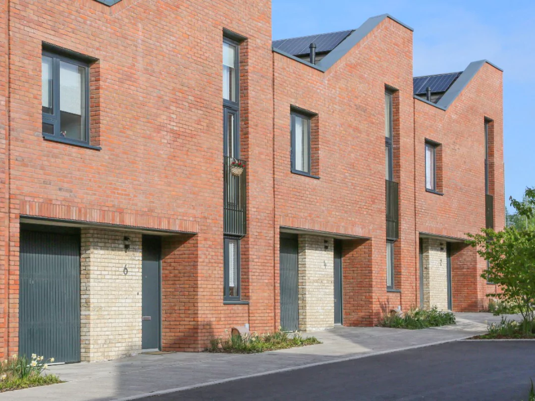 Row of red-brick terraced houses at Brabazon in Bristol