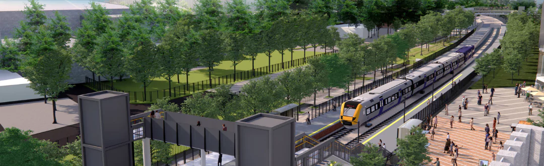 Rendering of a passenger train approaching the new train station at Brabazon, Bristol where people are waiting to board.