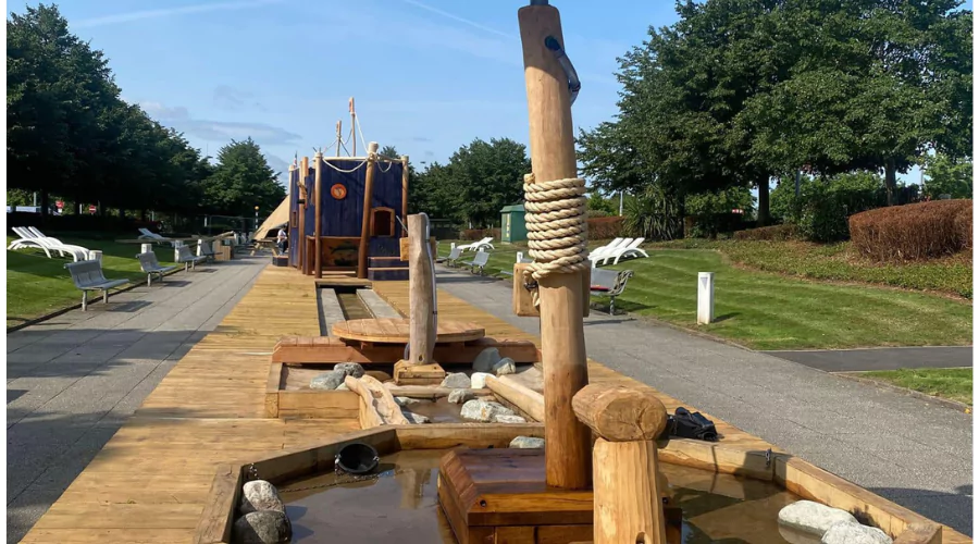 Wooden pirate ship climbing frame in free water garden at Cribbs Causeway.