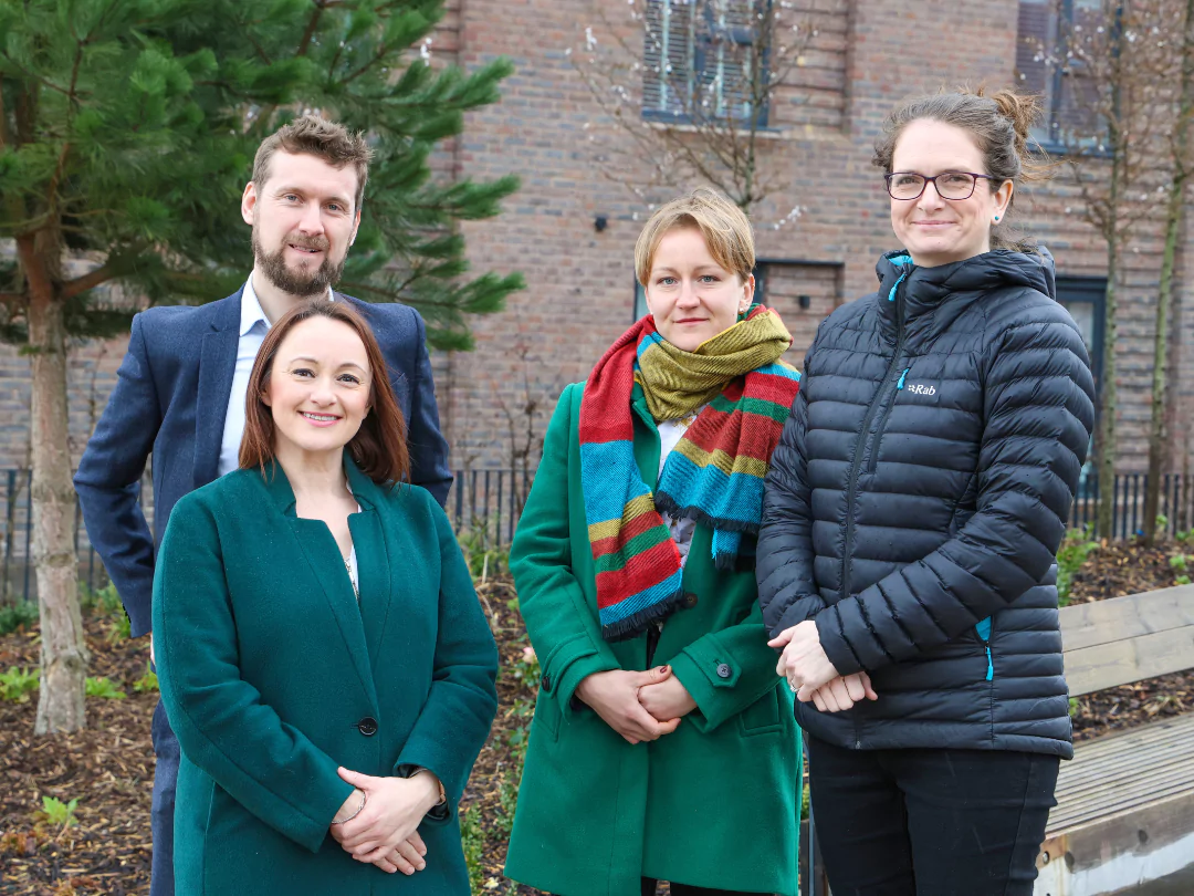 Members of Southern Brooks and YTL Developments standing together on a residential street at Brabazon. 