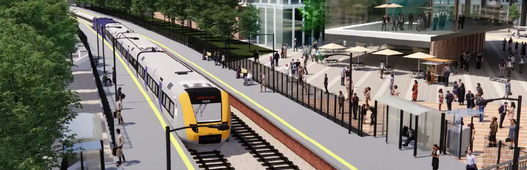 CGI of train platform at Brabazon, Bristol, showcasing a train arriving at a station with two platforms and step free access.